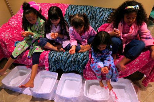 Party Guests Sitting On The Couch Having Pedicures For Girls! 