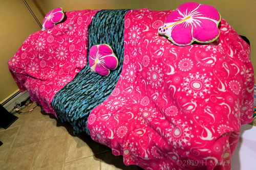 Sparkling Pink Spa Couch With Floral Cushions 