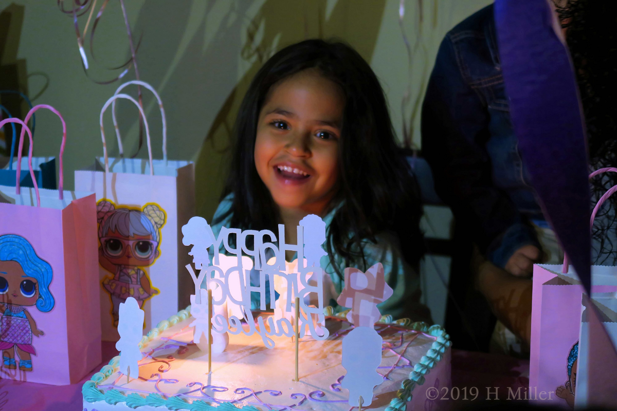 Birthday Girl Posing With Her Birthday Cake 1