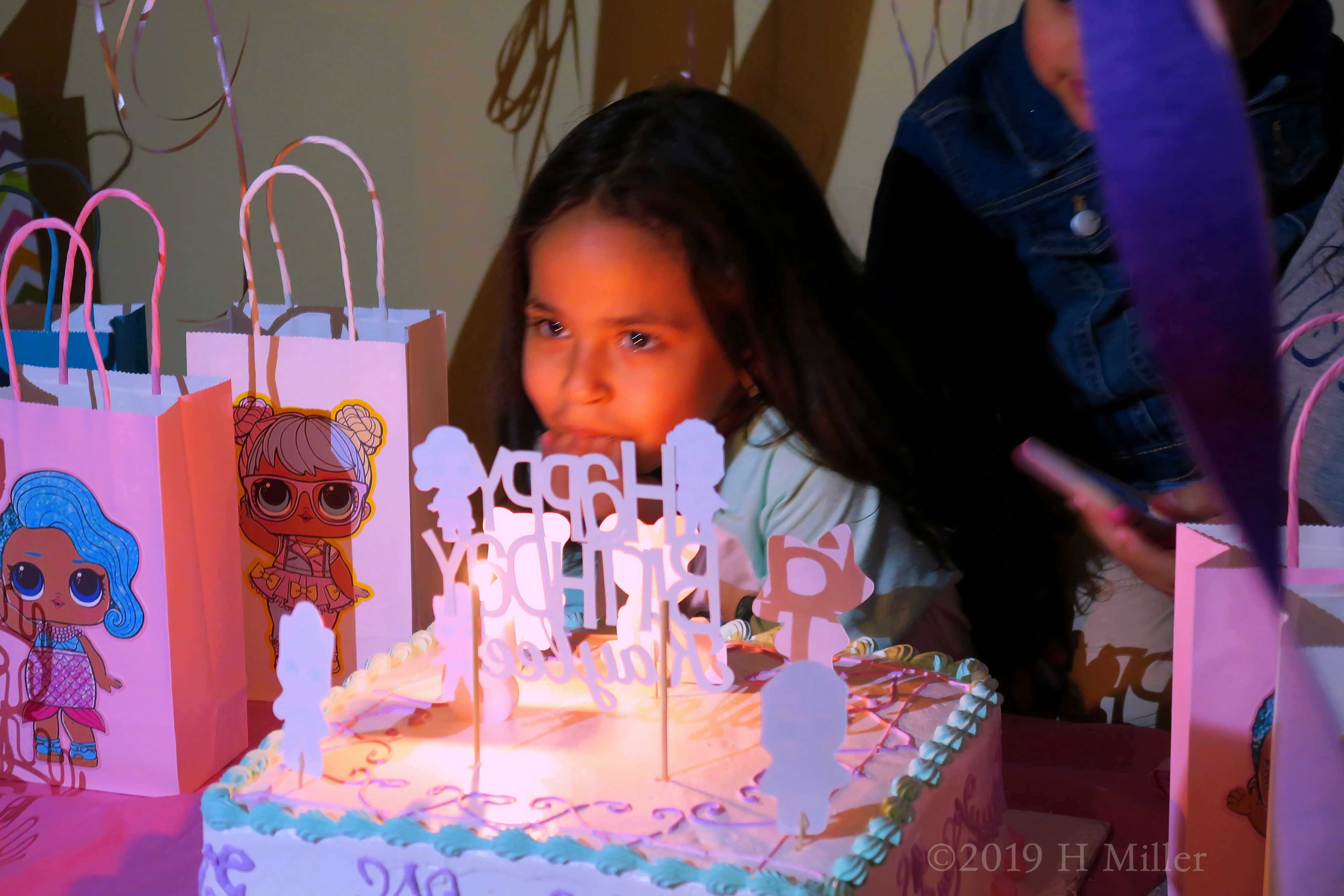 Birthday Girl Loving Her Cake At Her Birthday Party 4
