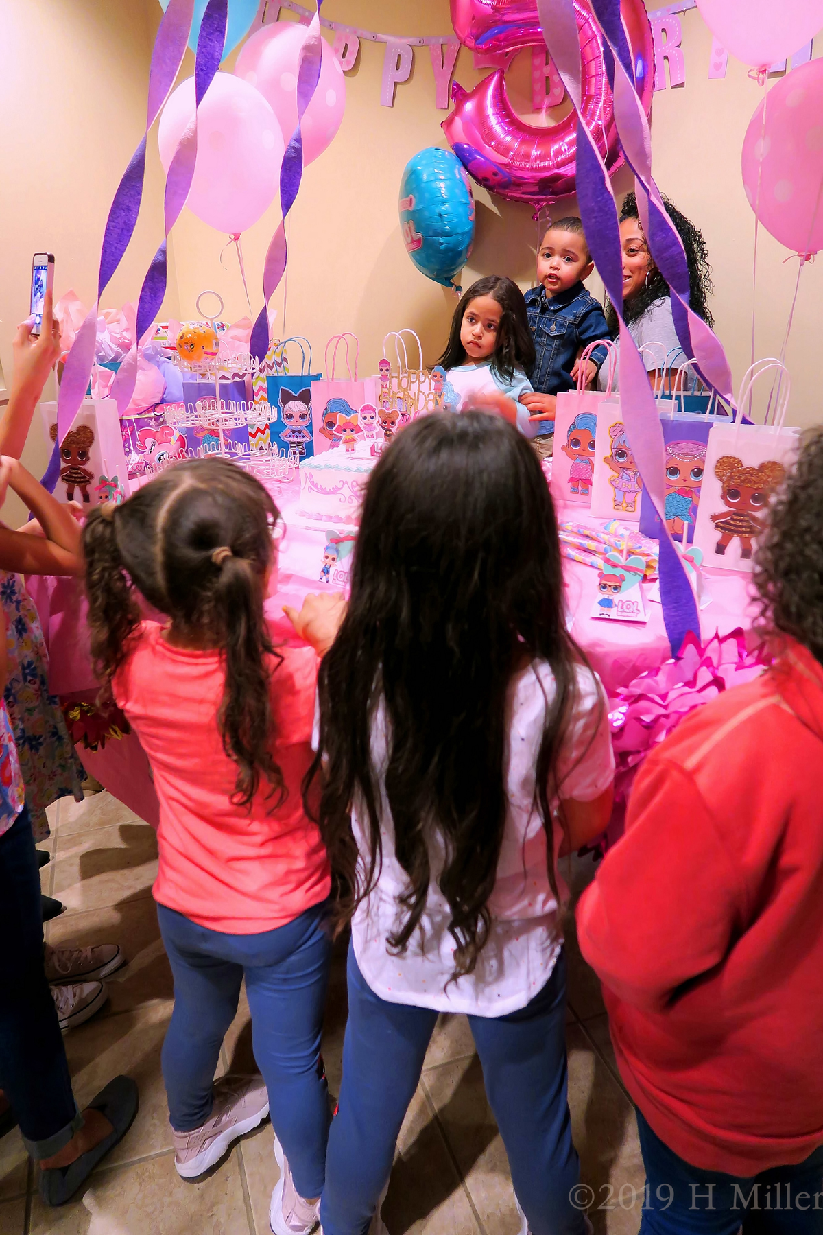 Whole Birthday Girl's Family Doing A Party Time Photo Session Whole Birthday Girl's Family Doing A Party Time Photo Session