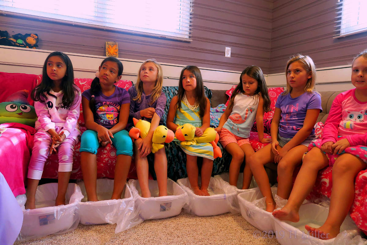 Birthday Girl And Friends Allowing Kids Pedicure FootbathsTo Soak In. 