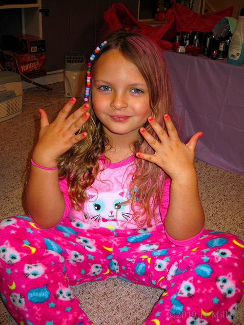 Party Guest Happy With Her Girls Manicure