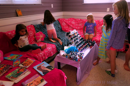 Party Guests Having A Chill Time At The Kids Pedicure Station.