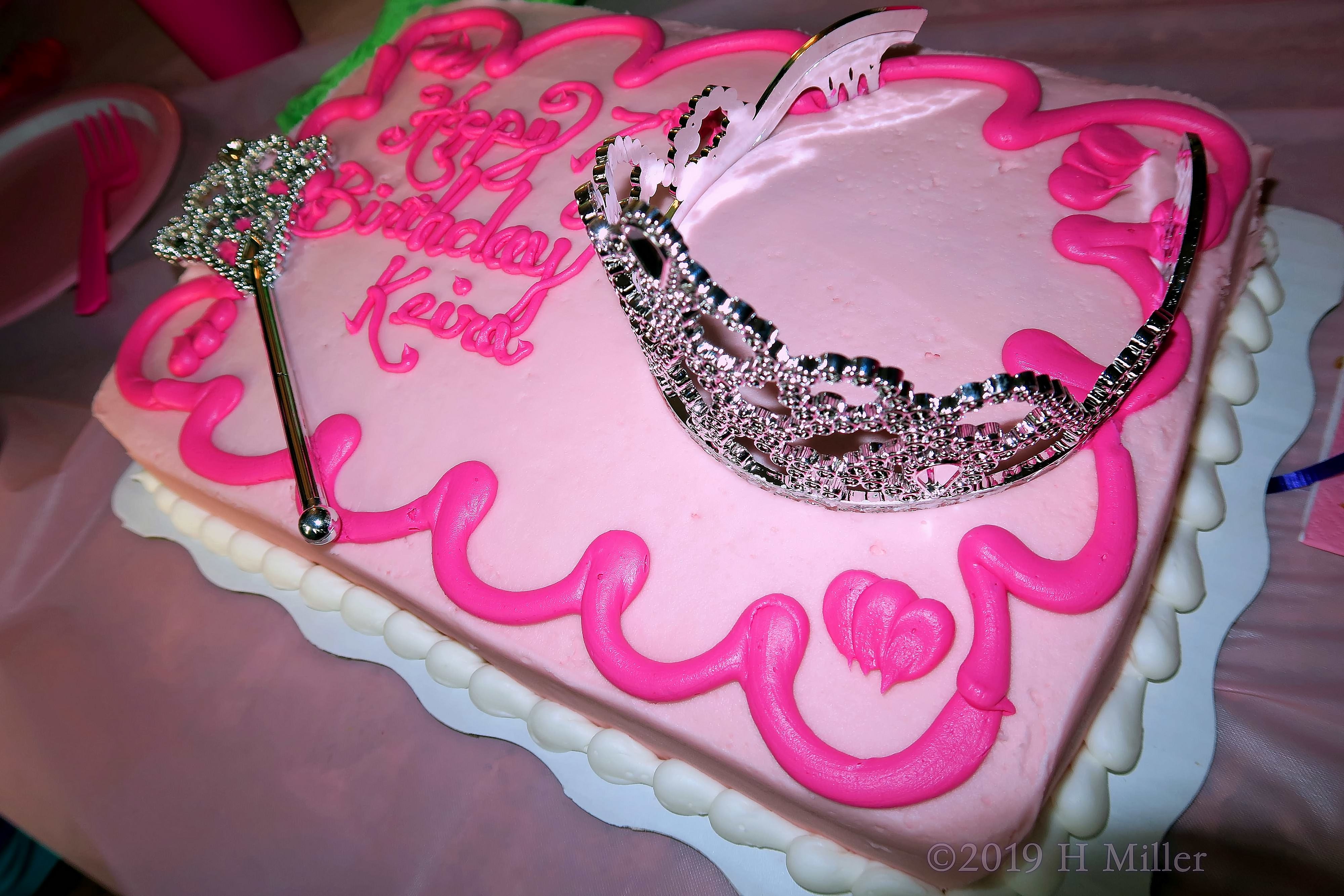 Pink And White Decor On Cake Complete With Princess Crown And Wand Pink And White Decor On Cake Complete With Princess Crown And Wand