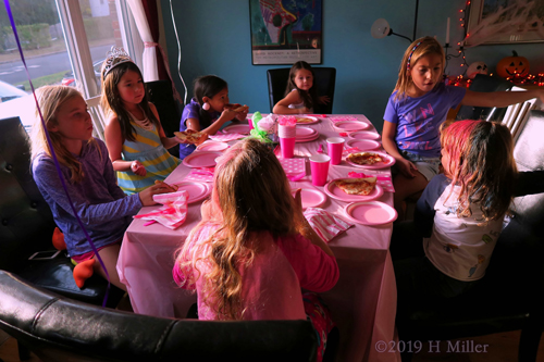 Birthday Girl And Guests Enjoy Party Eats Birthday Girl And Guests Enjoy Party Eats