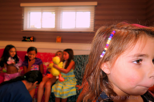 Multi Colored Beads Bring Out Her Kids Hairstyle