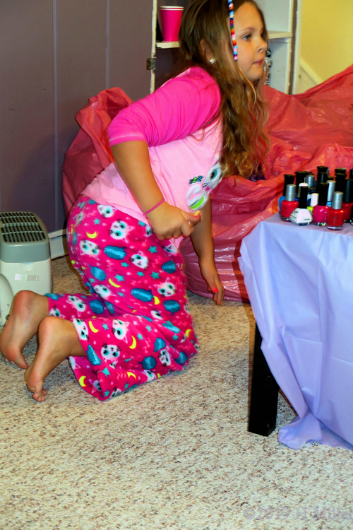 Party Guest Choosing Her Nail Art Colors