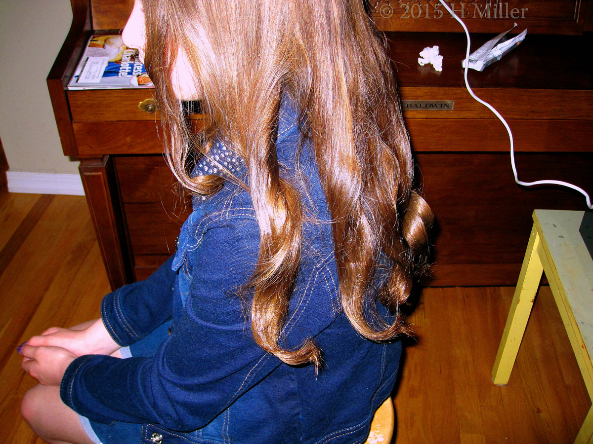 Side View Of Kids Curls Hair Style. 
