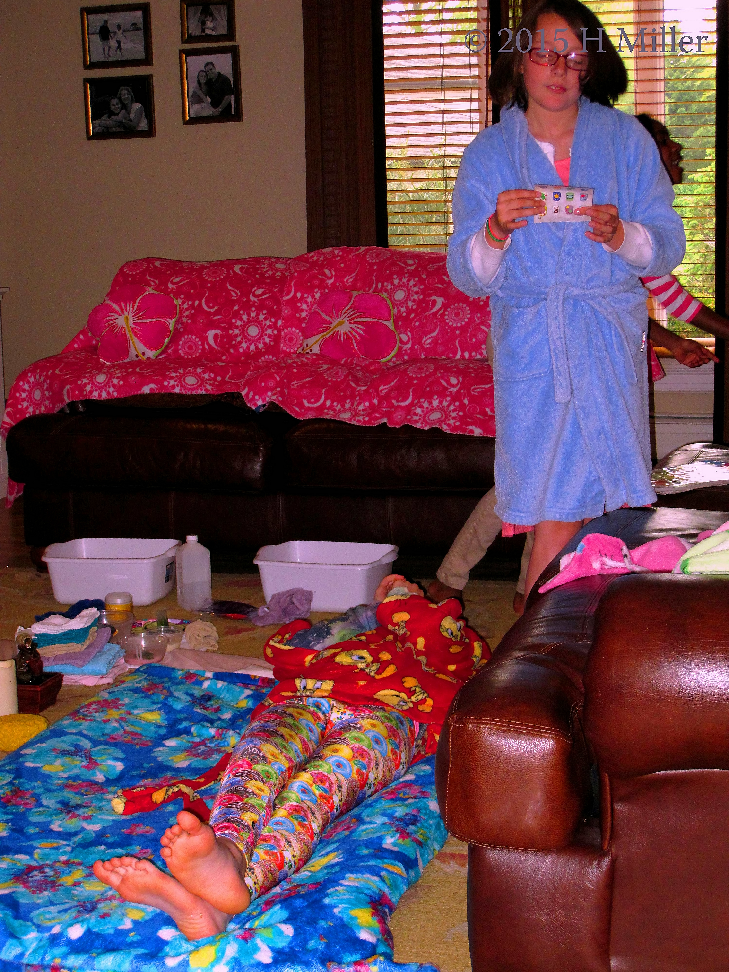 Checking Out A Page Of Nail Art While The Facial Continues. Checking Out A Page Of Nail Art While The Facial Continues.