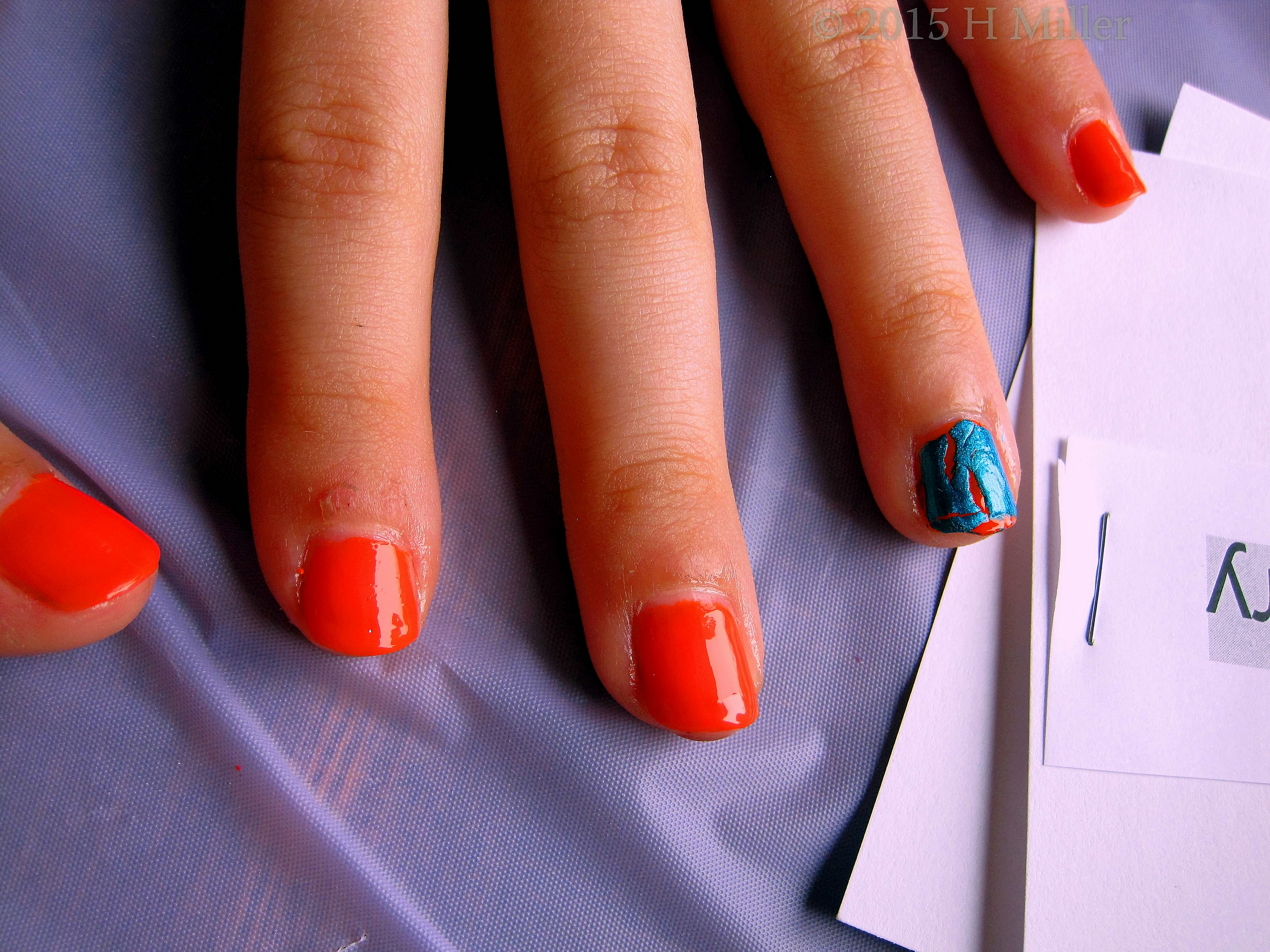 Orange Polish With OPI Crackle Top Coat. Other Hand 