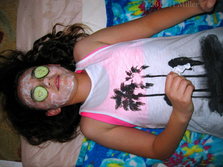 With Cukes On Her Eyes, And Vanilla Yogurt Masque On Her Skin, The Birthday Girl Relaxes. With Cukes On Her Eyes, And Vanilla Yogurt Masque On Her Skin, The Birthday Girl Relaxes.