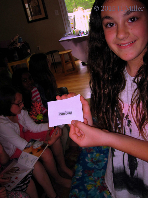 Kelsey Shows One Of The Manicure Cards She Made.