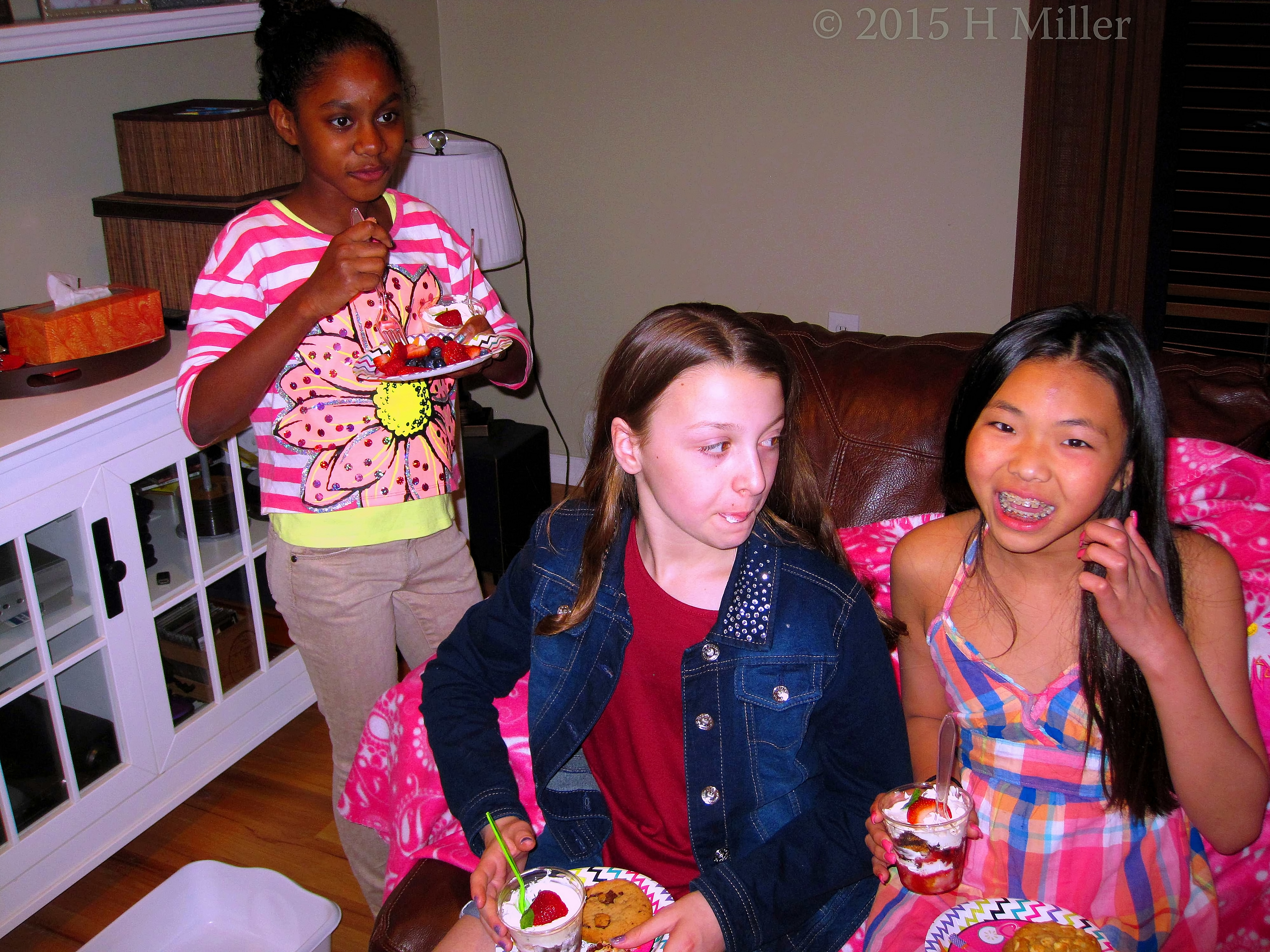 Enjoying The Birthday Goodies! The Girls Relax On The Couch. 