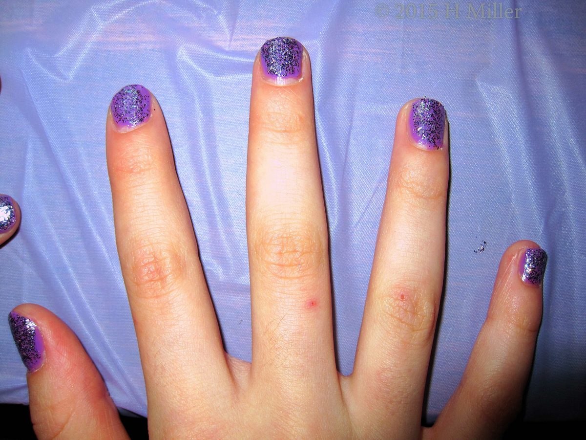 Lavender Nail Pollish With Glitter. 