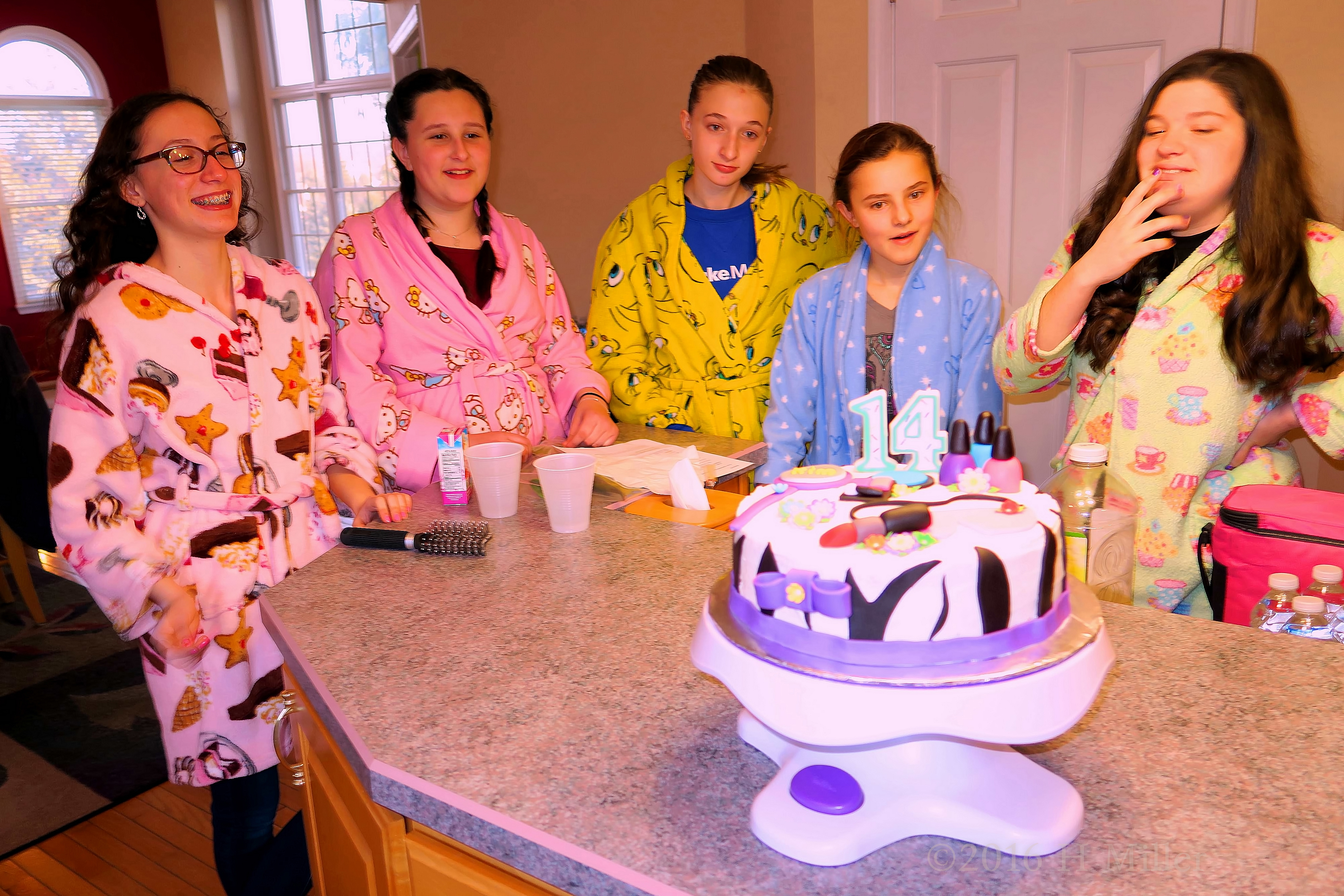 Cute Group Pic Around The Spa Themed Cake! 