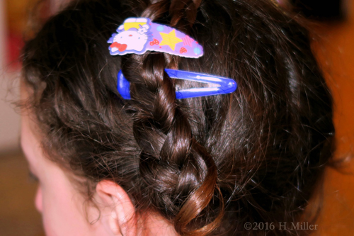 Cute Clips In A Beautiful Braid Kids Hairstyle. Cute Clips In A Beautiful Braid Kids Hairstyle.