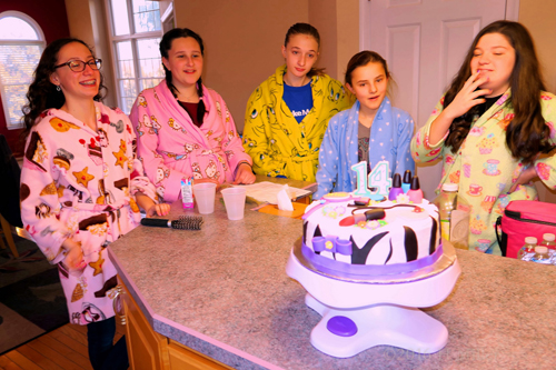 Cute Group Pic Around The Spa Themed Cake!