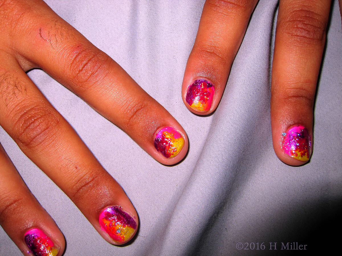 Cute Pink, Purple, And Yellow Splatter Paint Manicure 