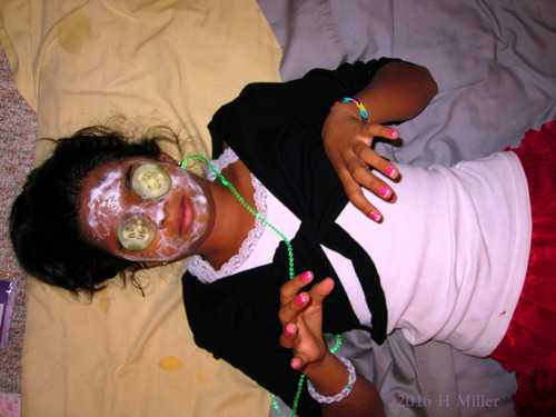 Relaxing In A Vanilla Face Mask While Her Nails Dry Relaxing In A Vanilla Face Mask While Her Nails Dry