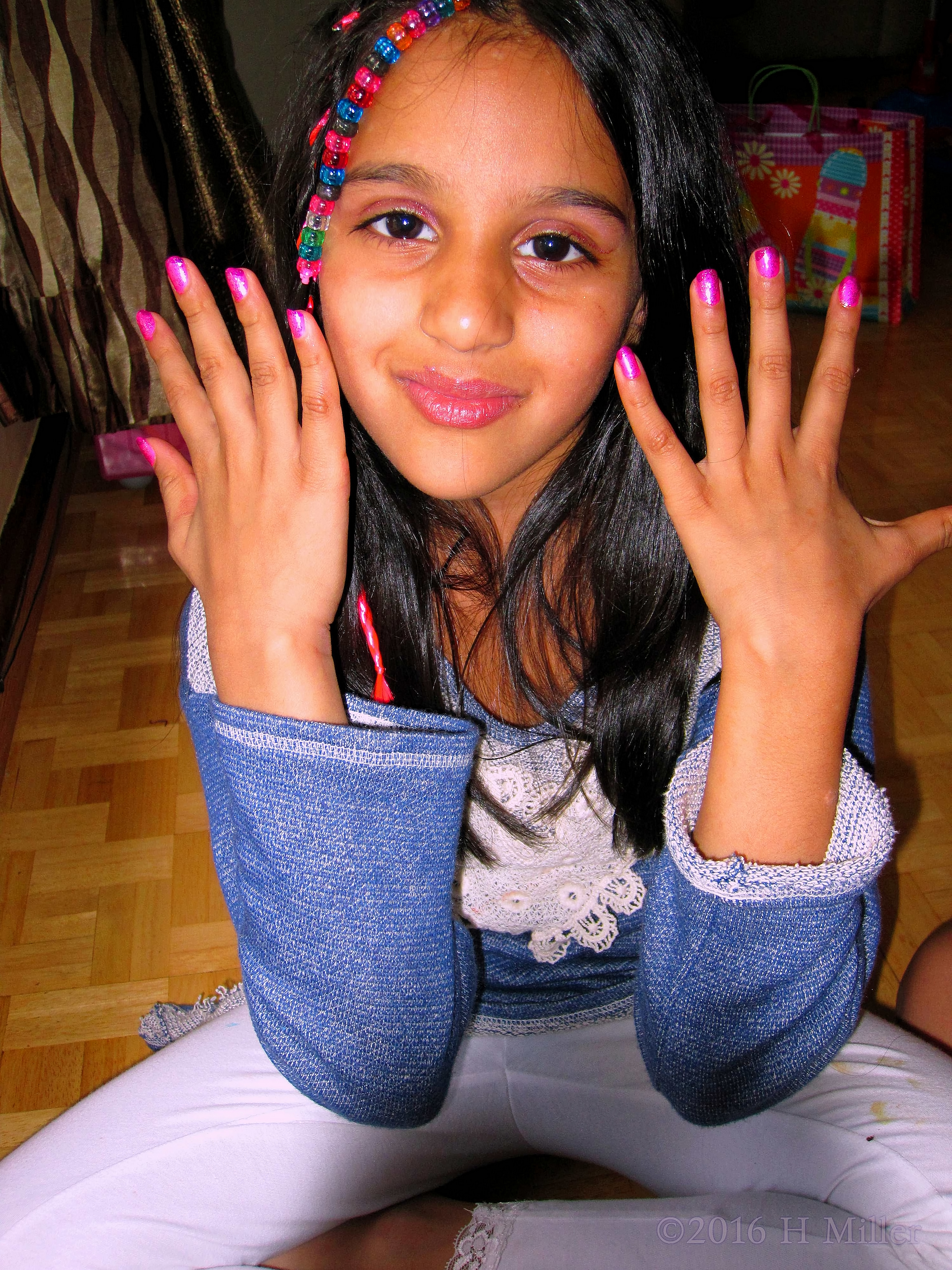 Check Out Her Hair Beading And Pink Manicure! Check Out Her Hair Beading And Pink Manicure!