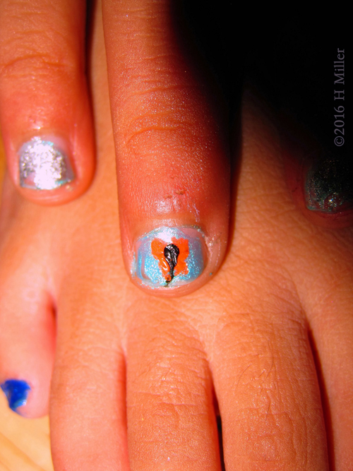 She Has A Butterfly On Her Nail!
