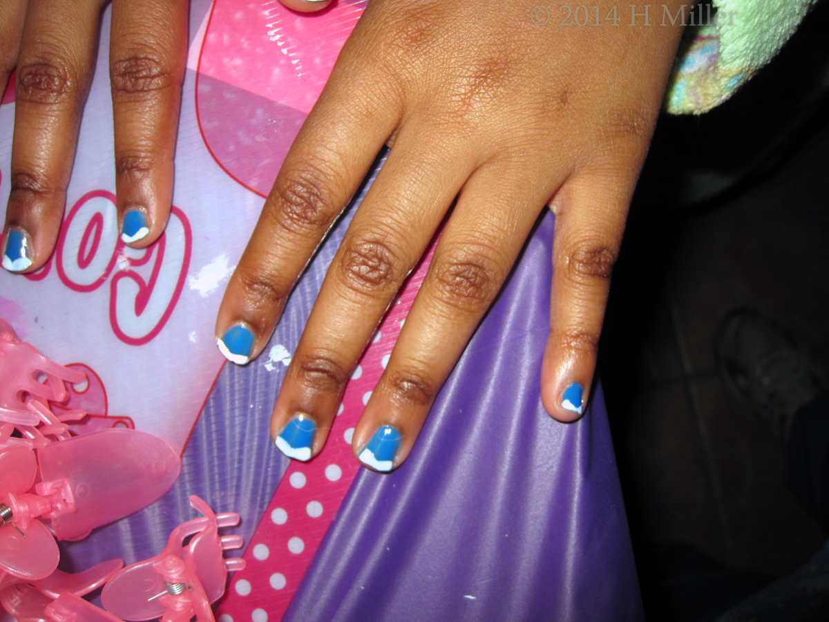 French Nails On Sky Blue Background. 