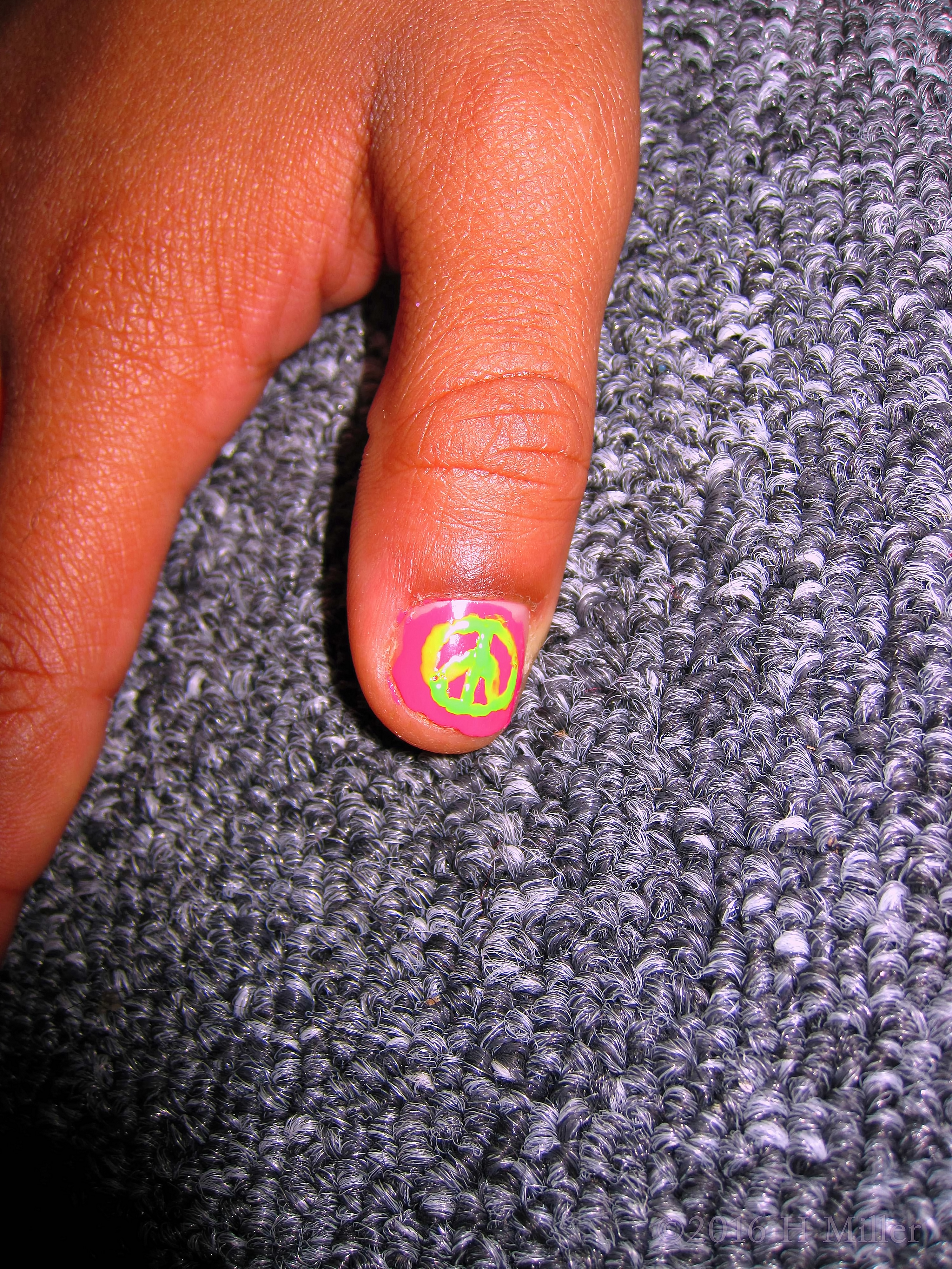 She Has A Piece Sign On Her Nails! She Has A Piece Sign On Her Nails!