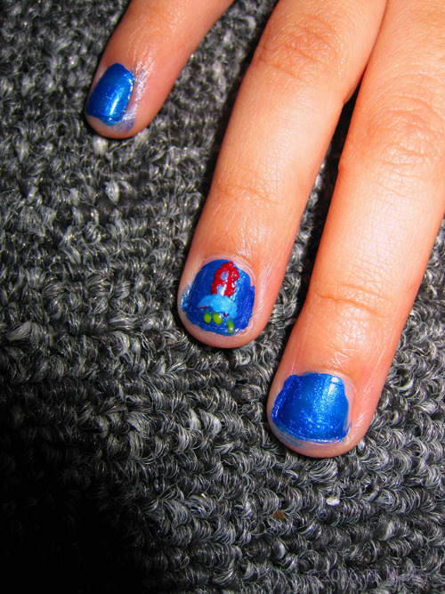 Cool Blue Kids Manicure With An Outer Space Rocket Nail Design