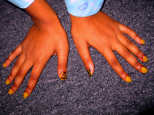 Cute Yellow Manicure With Animal Print Designs!