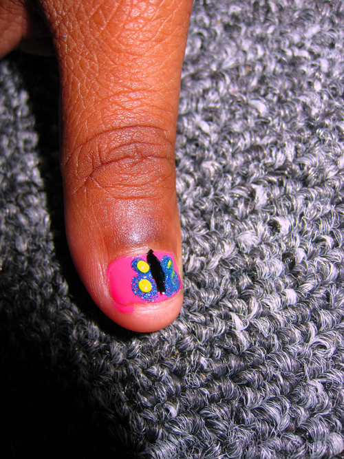 She Has A Butterfly On Her Nail! She Has A Butterfly On Her Nail!