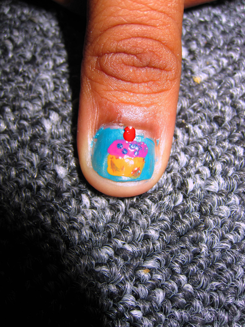 She Has A Cupcake On Her Nail!