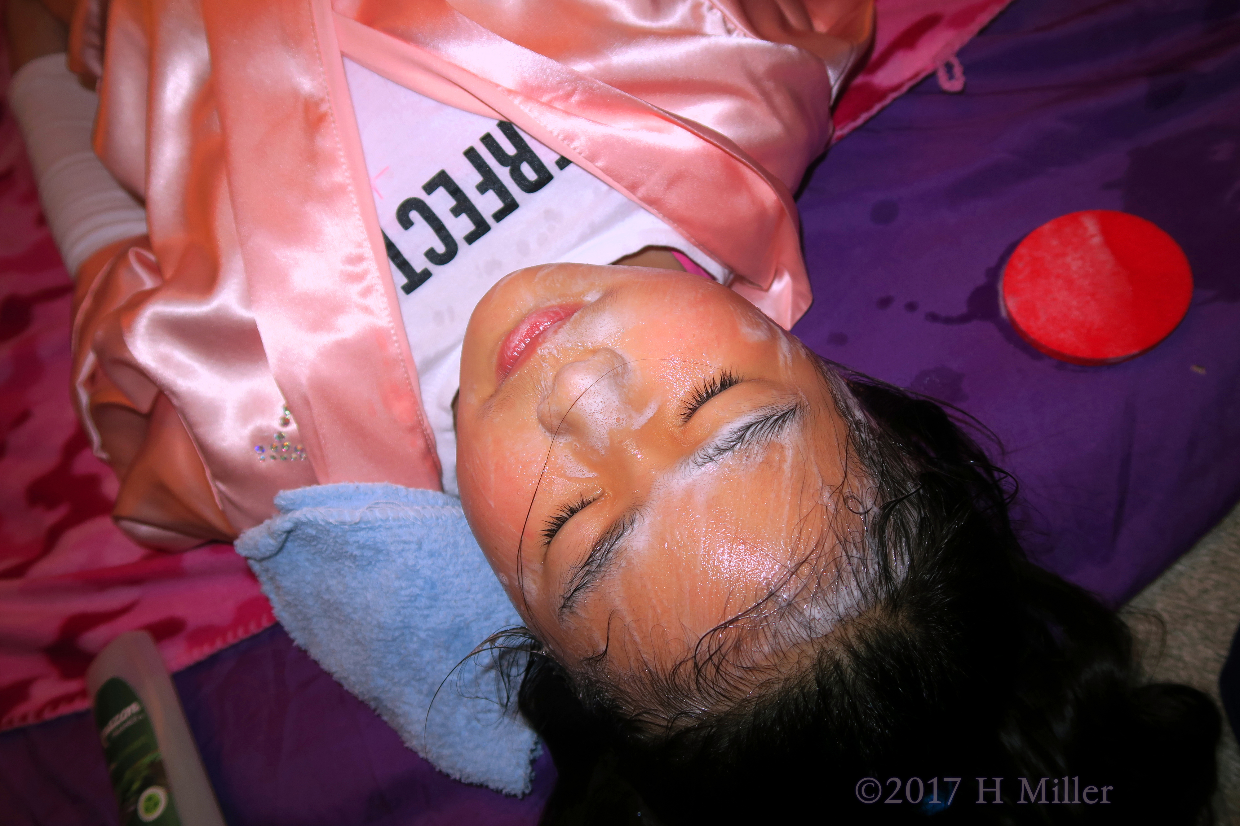 Feeling Relaxed During Her Kids Facial. Feeling Relaxed During Her Kids Facial.