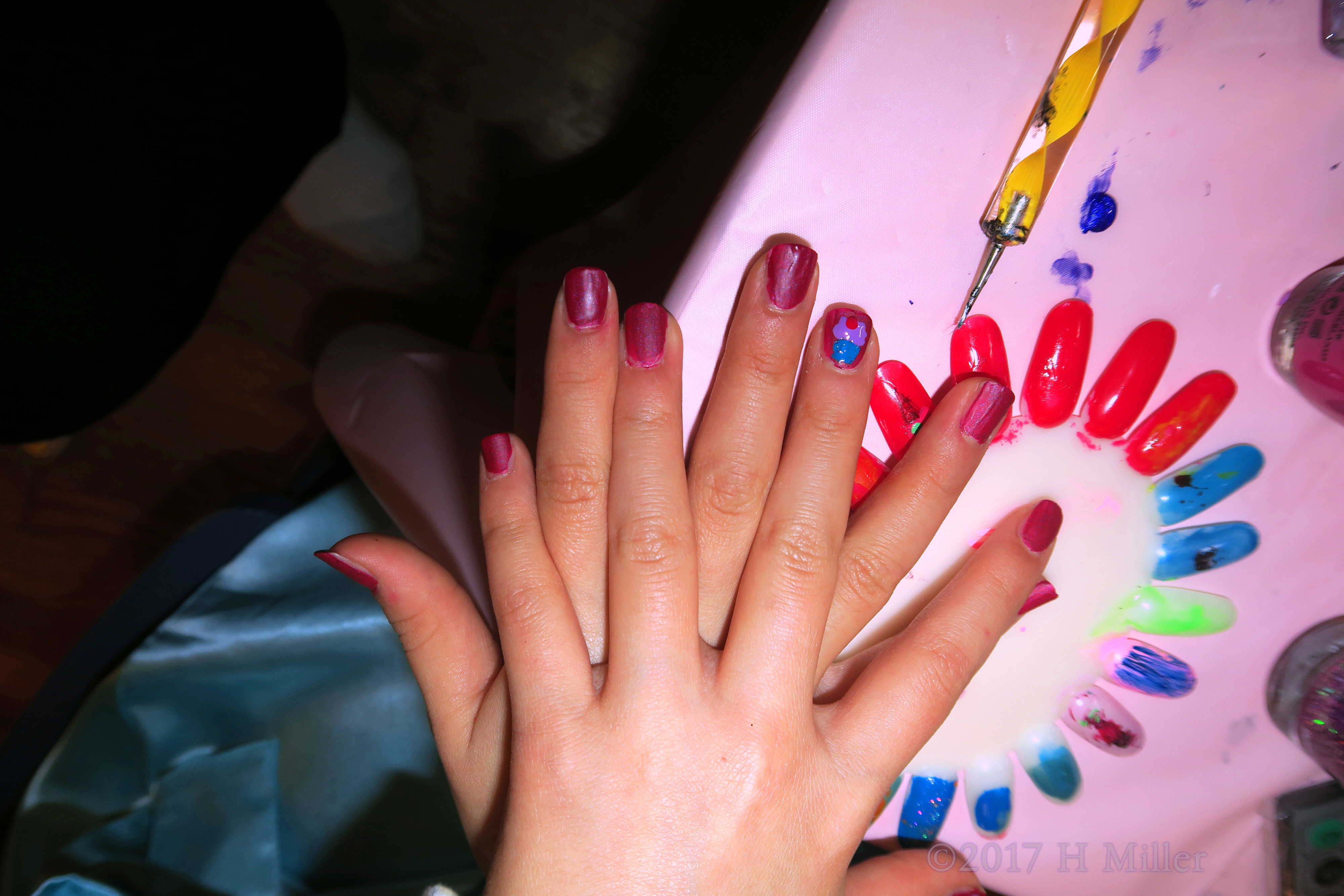 Showing Her Pretty Kids Manicure. Showing Her Pretty Kids Manicure.