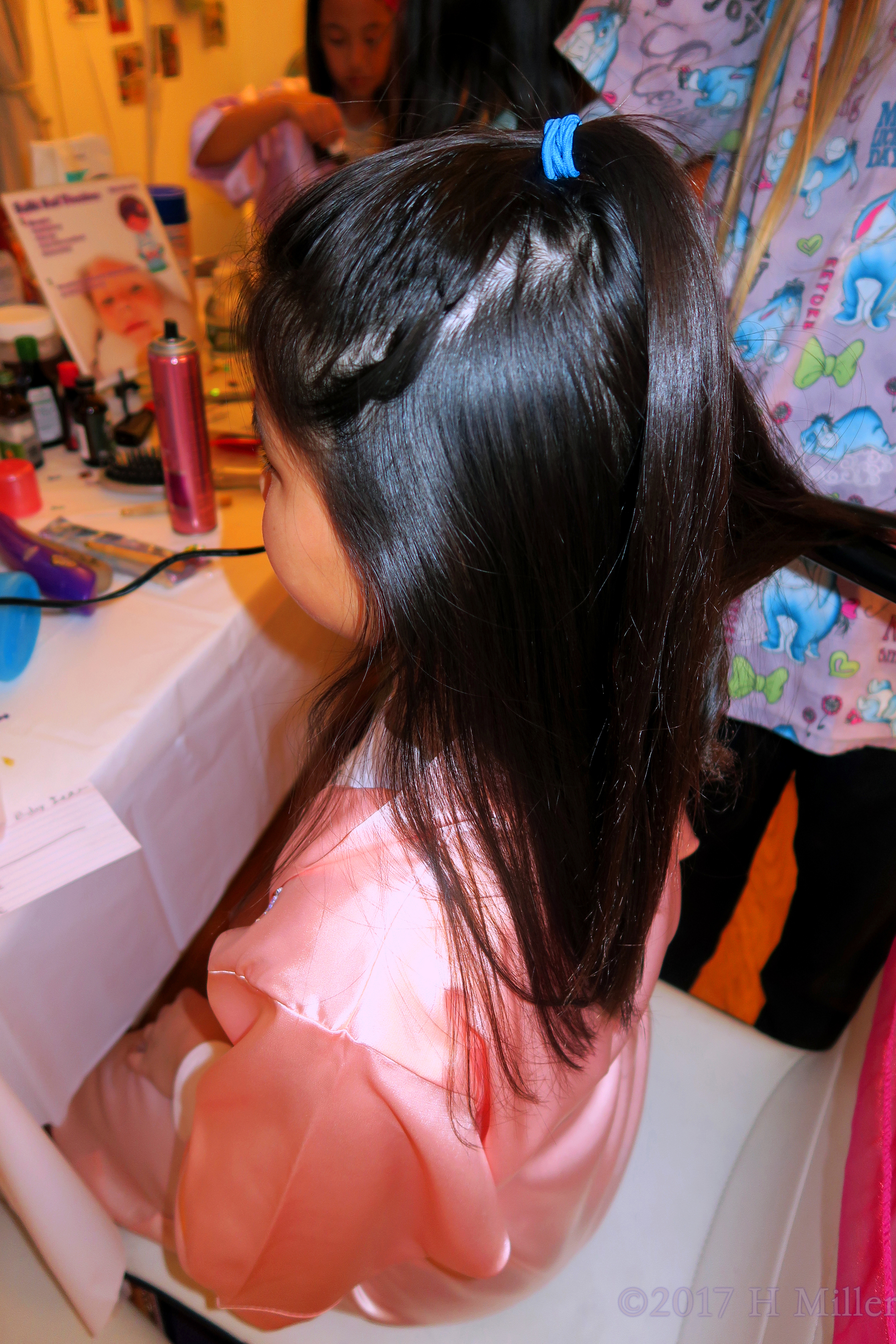 Side View Of The Cool Hairstyle She Gets. Side View Of The Cool Hairstyle She Gets.