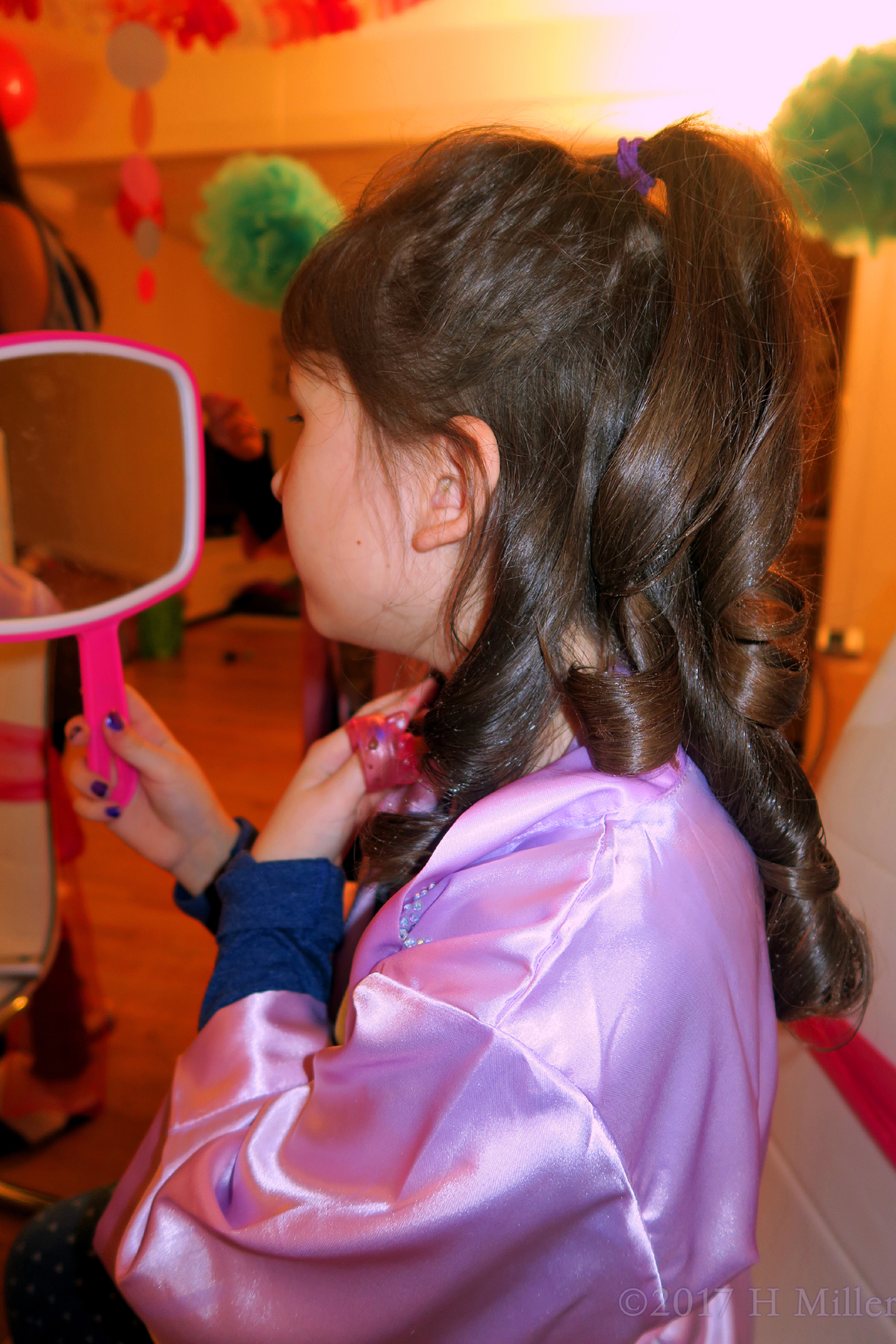 Having A Look Of Her Beautiful Curled Kids Hairstyle In The Mirror! 