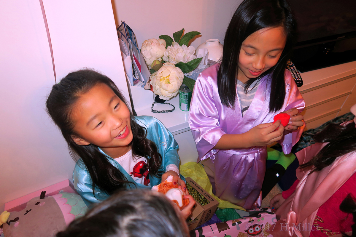 Lea Rejoices After Having Such Cute Piggy Bank. 