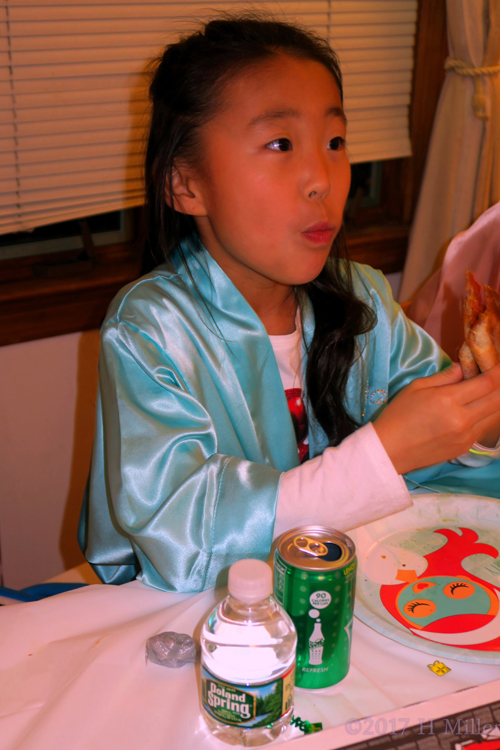 Lea Is Having A Big Bite Of Yummy Pizza. Lea Is Having A Big Bite Of Yummy Pizza.