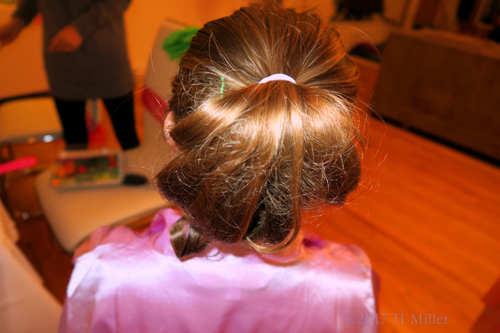 Pony Tail Curved Inside With Slight Curls Is Easy To Go Hairstlye For Kids. Pony Tail Curved Inside With Slight Curls Is Easy To Go Hairstlye For Kids.