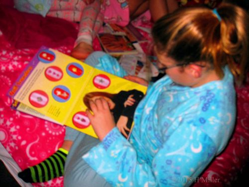 Perusing The Kids Nail Art Book. Perusing The Kids Nail Art Book.