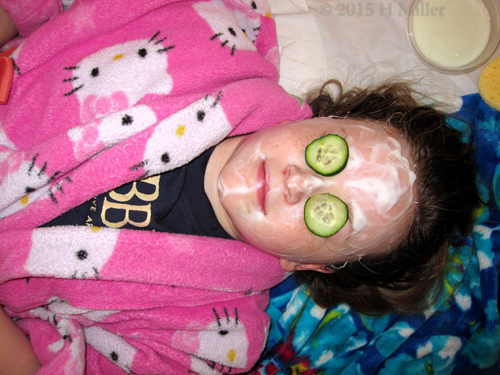 Vanilla Yogurt Masque With Cucumbers Over The Eyes.
