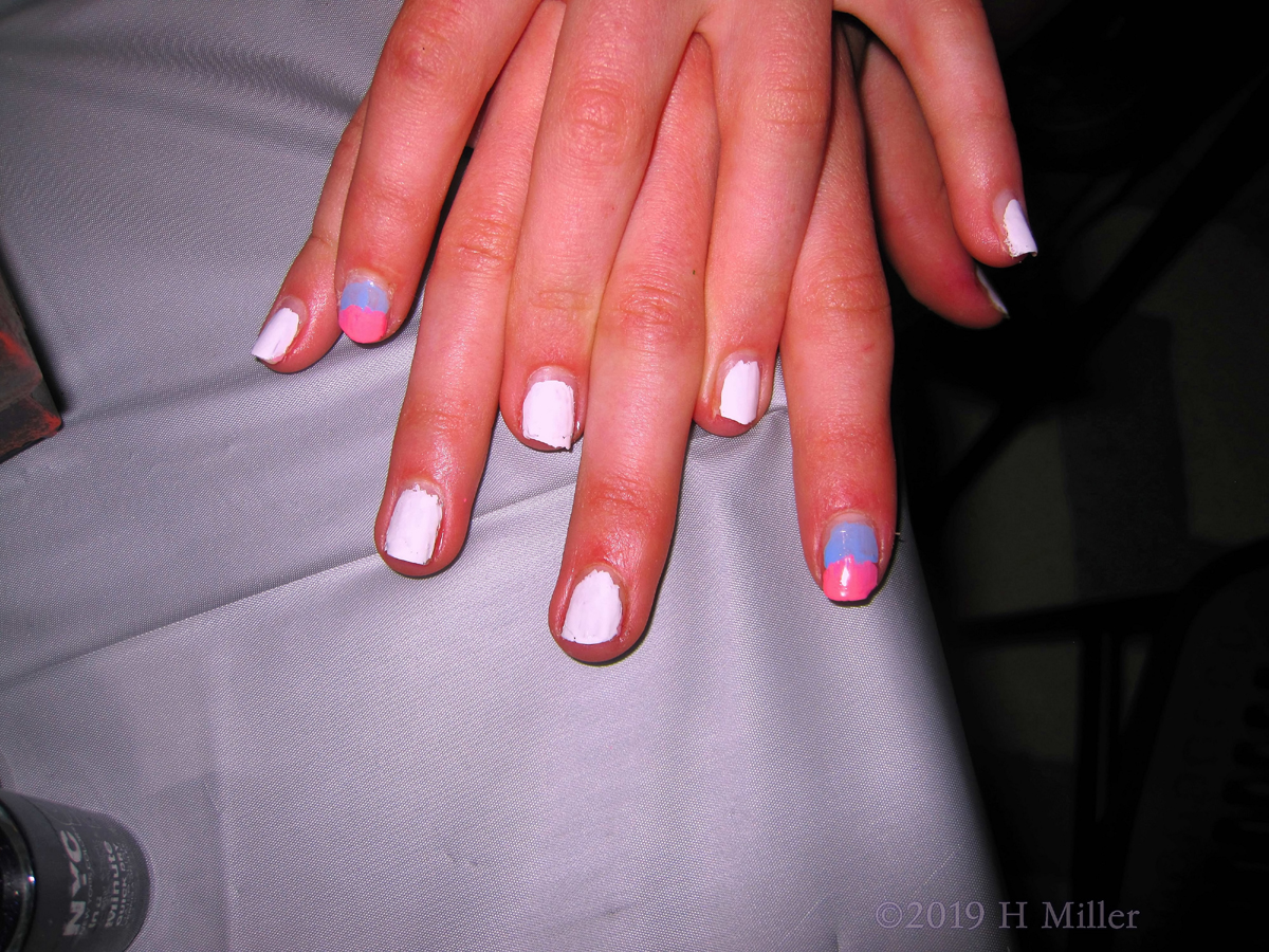A Cool Girls Mani Design Of White,With Pink And Blue Ombre Nail Design.