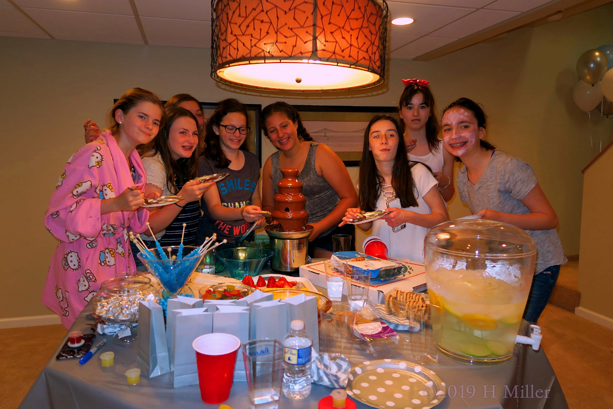 A Group Photo With Mackenzie At The Snacks Table 1