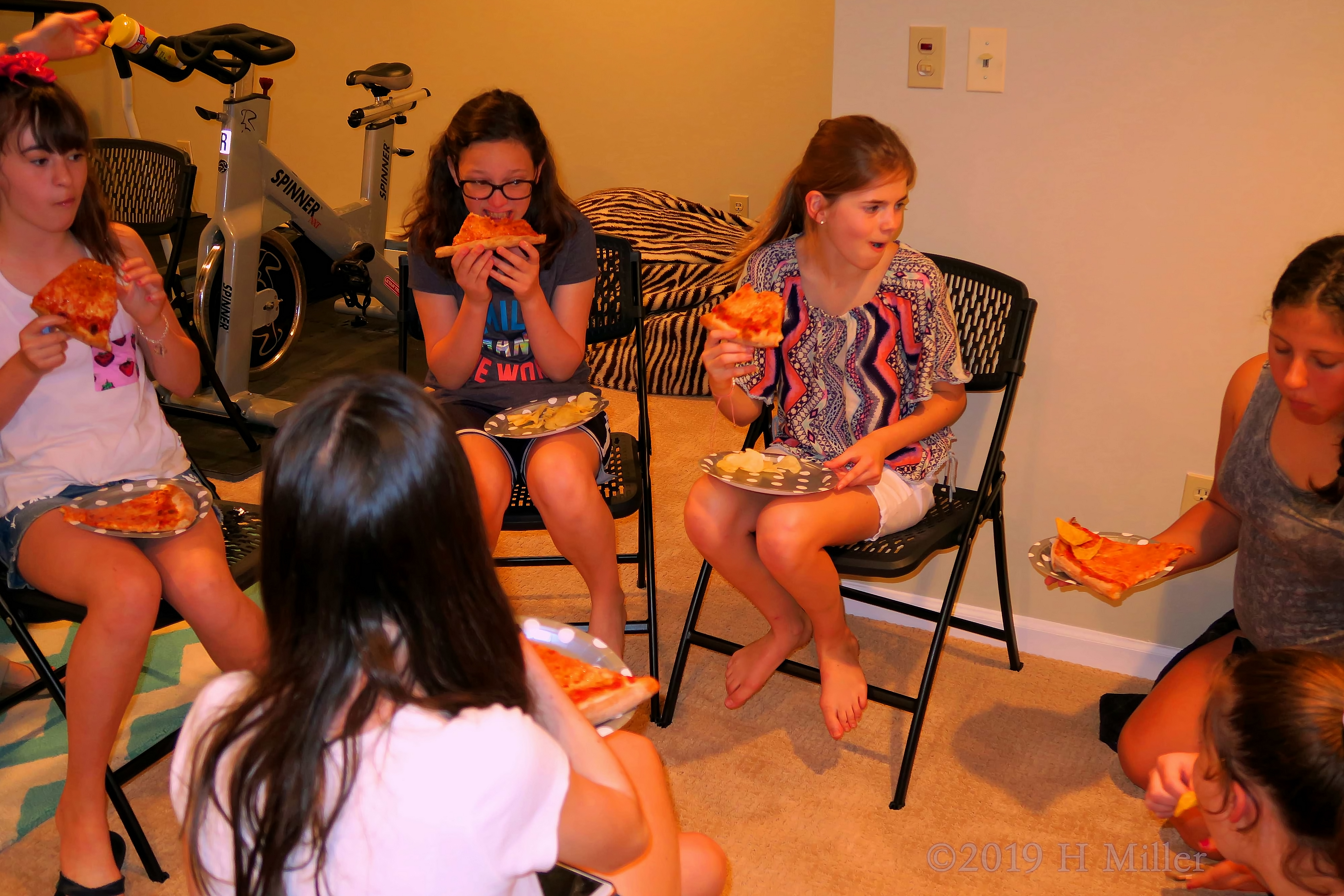 Girls Enjoying Slices Of Birthday Pizza 