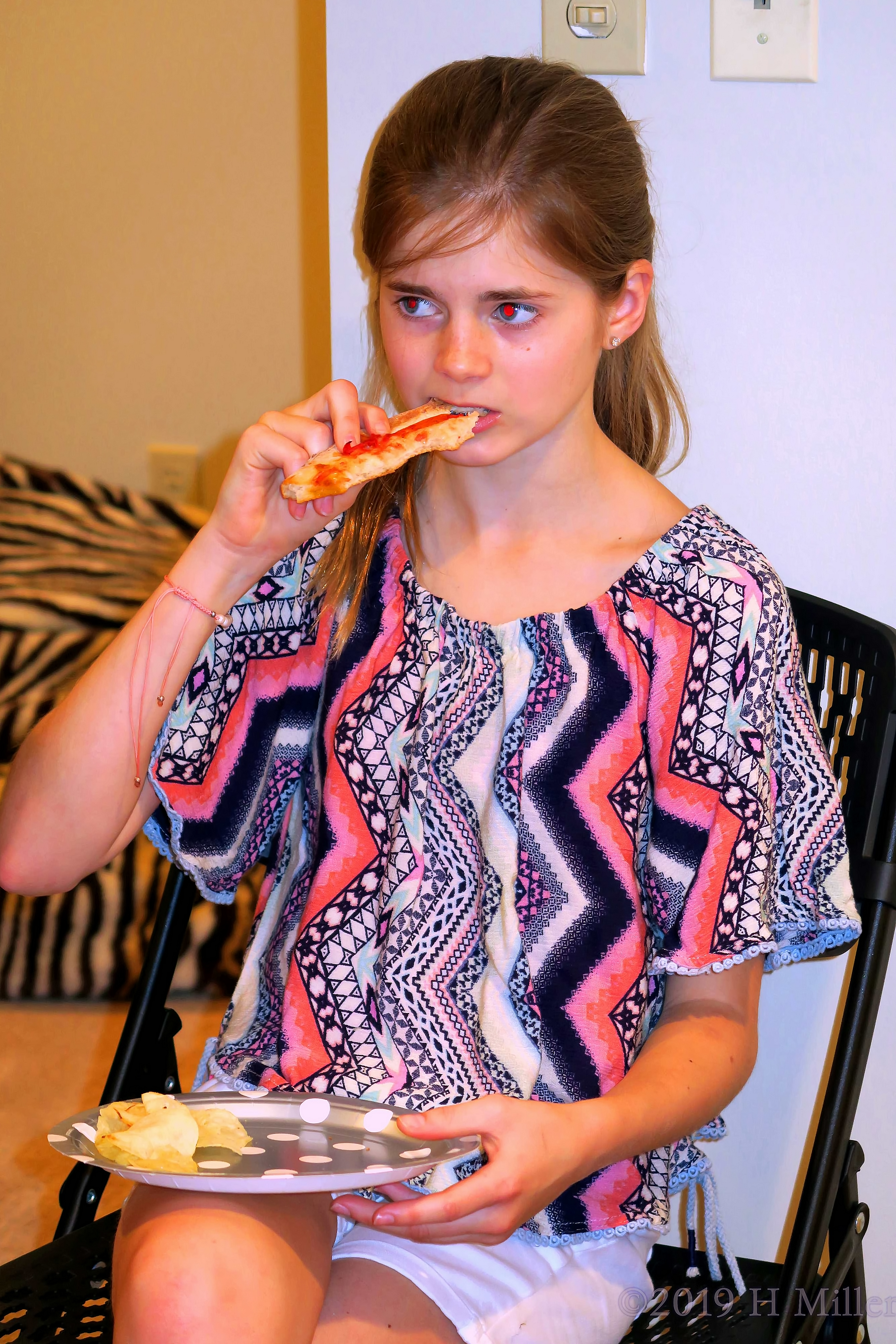 Mackenzie Is Enjoying A Slice Of Pizza Mackenzie Is Enjoying A Slice Of Pizza