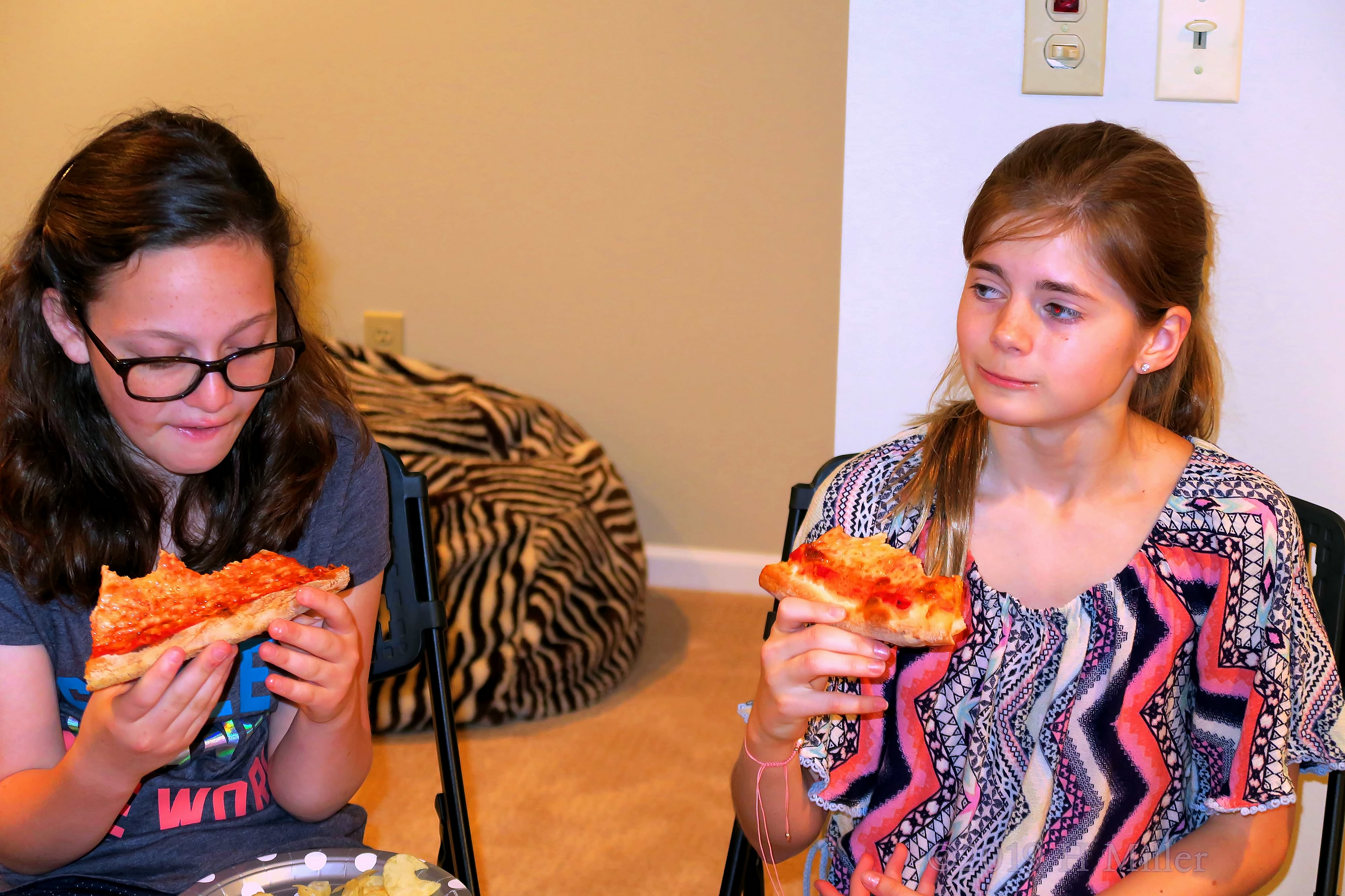 Mackenzie Is Enjoying A Slice Of Pizza With A Friend Mackenzie Is Enjoying A Slice Of Pizza With A Friend