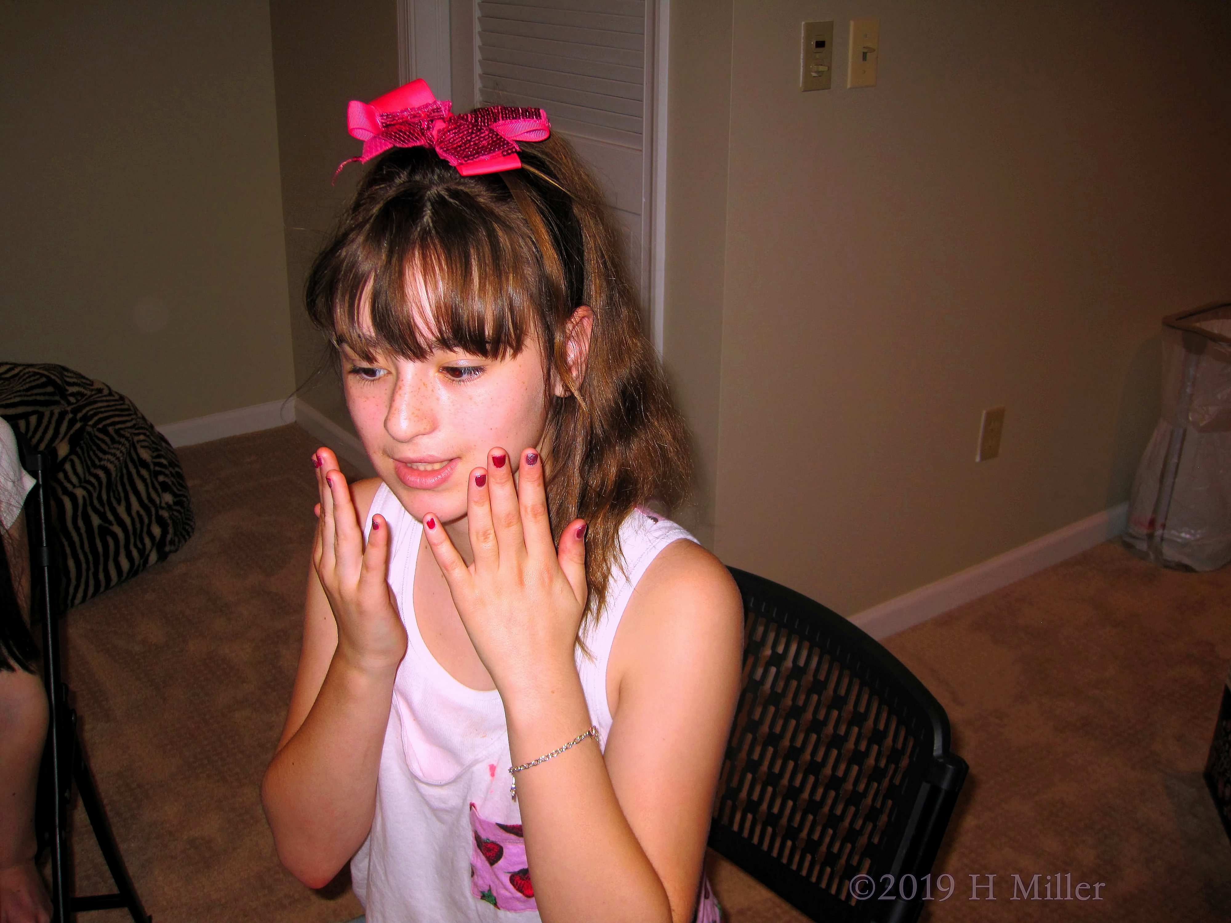 Spa Party Guest With A Cool Girls Manicure With Hot Pink And Shimmery Silver Glitter. Spa Party Guest With A Cool Girls Manicure With Hot Pink And Shimmery Silver Glitter.