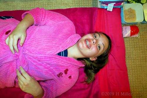 Girl Posing In Spa Robe Before Kids Facials Girl Posing In Spa Robe Before Kids Facials