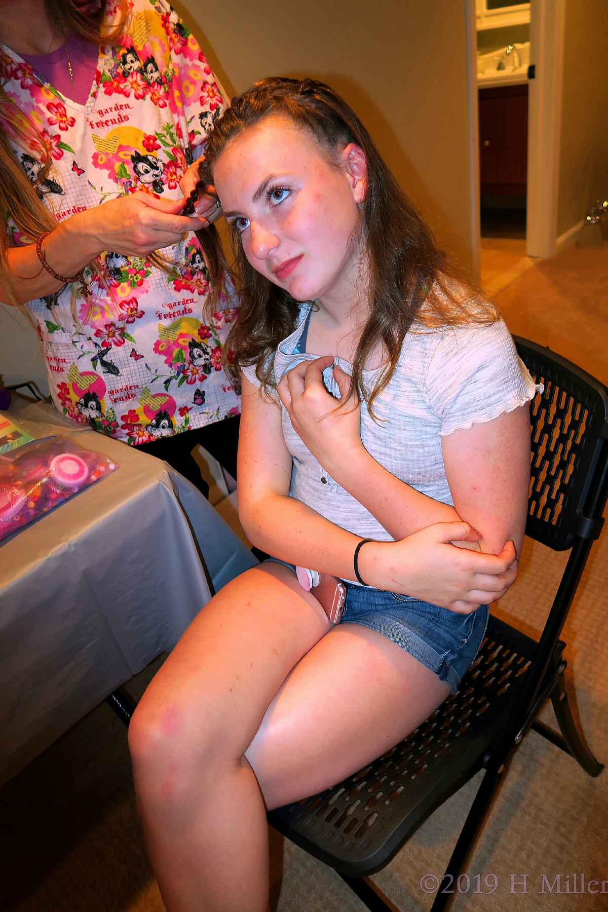 Girl Getting Pretty Kids Hairstyle At The Spa Birthday Party