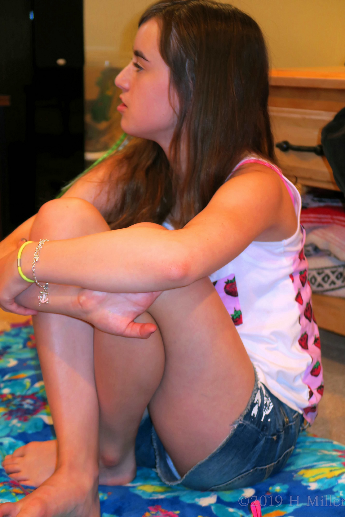 Girl Sitting On Cute Spa Mat 